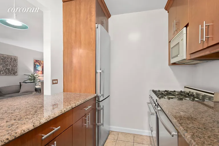 New York City Real Estate | View 175 West 12th Street, 14F | Featuring a pass through and dishwasher | View 5