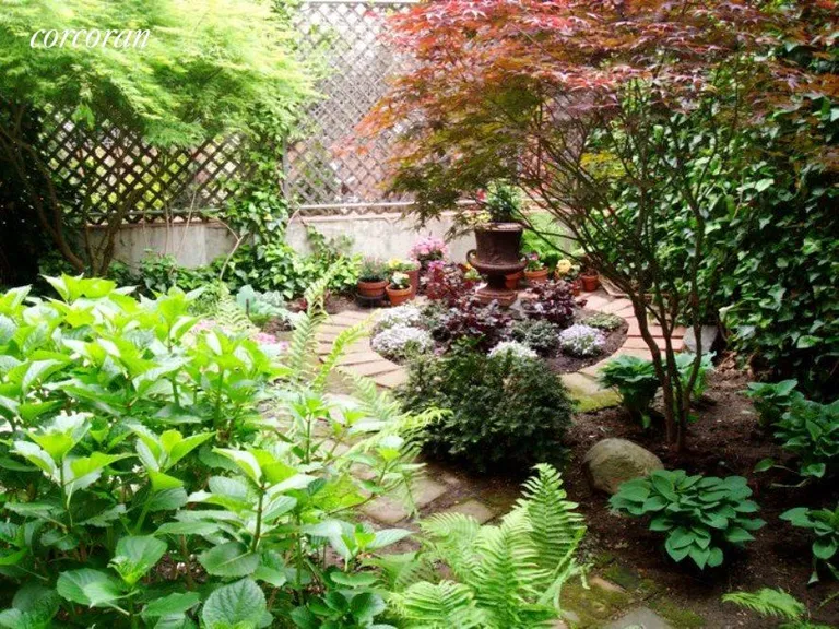New York City Real Estate | View 313 Clinton Avenue, 1 | Private Garden in Bloom | View 9