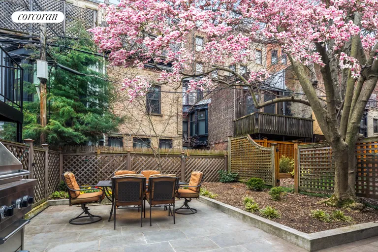 New York City Real Estate | View 555 1st Street | Cherry blossoms above dining and play space | View 19