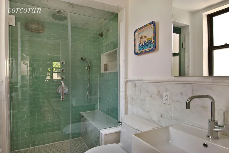 New York City Real Estate | View 30 East 9th Street, 4C | Windowed Master Bathroom | View 7