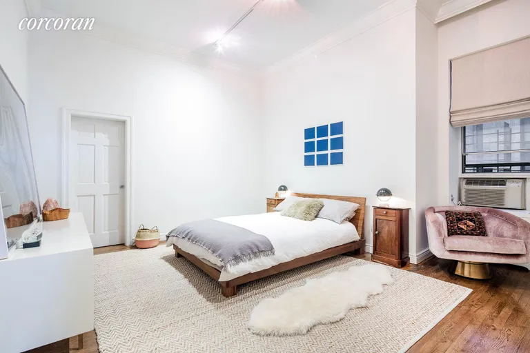 New York City Real Estate | View 23 East 10th Street, 412 | Master suite with en suite bath and walk-in closet | View 4