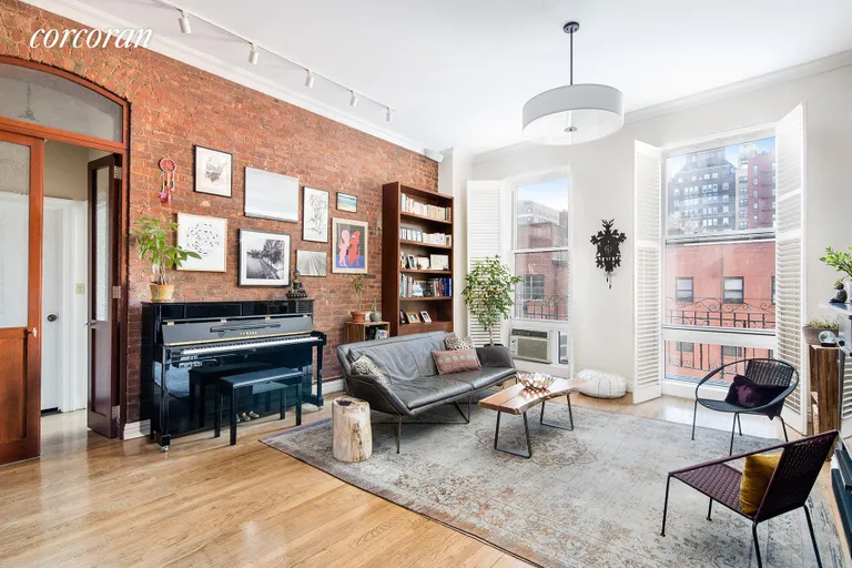 New York City Real Estate | View 23 East 10th Street, 412 | 3 Beds, 2 Baths | View 1