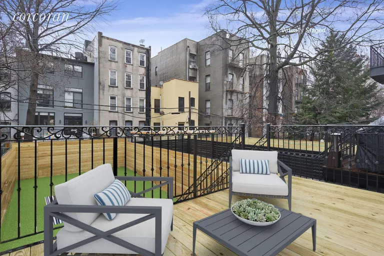 New York City Real Estate | View 143 Monroe Street | Deck leading out from the kitchen | View 3