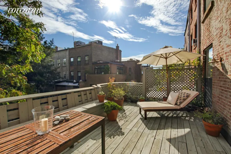 New York City Real Estate | View 363 Henry Street, 3 | Terrace with built in dining area | View 12