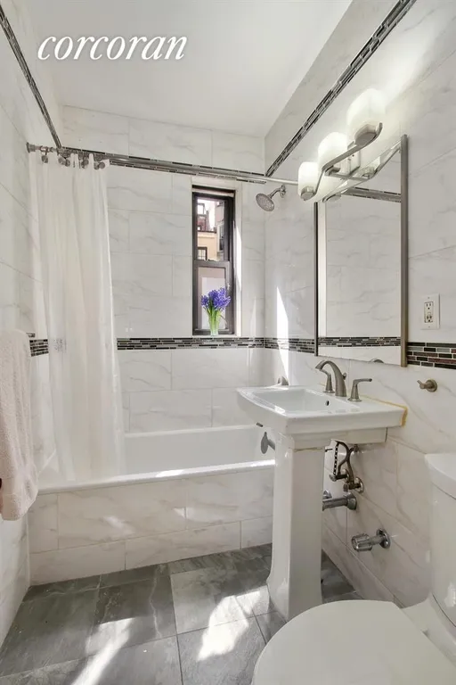 New York City Real Estate | View 100 West 12th Street, 1A | Renovated Bathroom | View 5