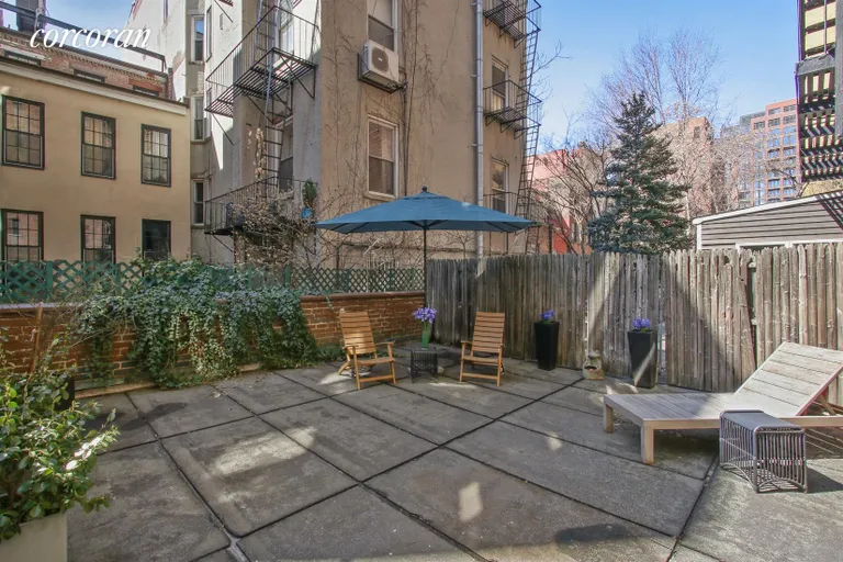 New York City Real Estate | View 100 West 12th Street, 1A | 500SF Back Yard | View 3