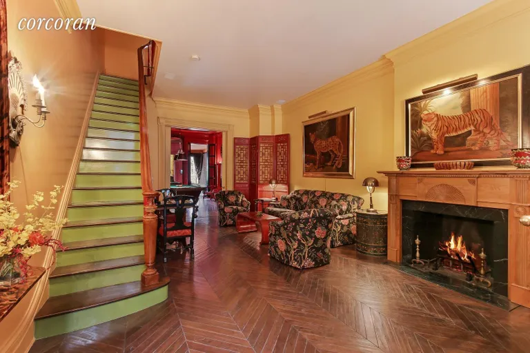 New York City Real Estate | View 179 East 80th Street | Back House Living Room into Game Room | View 19
