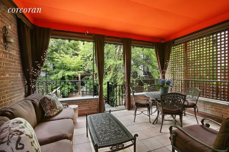 New York City Real Estate | View 179 East 80th Street | Loggia above Pool | View 21