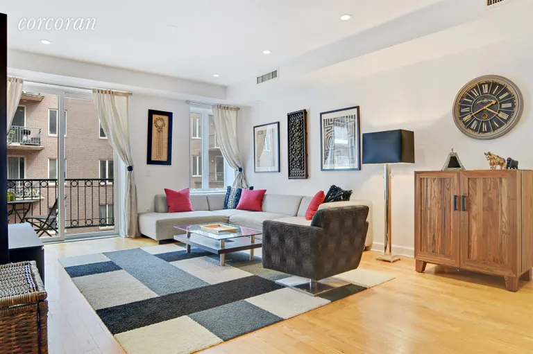New York City Real Estate | View 305 3rd Street, 2H | Living room with balcony overlooking the courtyard | View 2