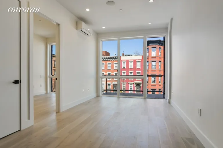 New York City Real Estate | View 134 Quincy Street, 3A | spacious living room with balcony | View 4