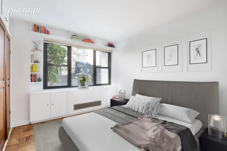 New York City Real Estate | View 115 East 9th Street, 5R | Comfortable bedroom with huge window | View 3
