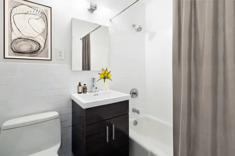 New York City Real Estate | View 115 East 9th Street, 5R | Renovated bathroom | View 4