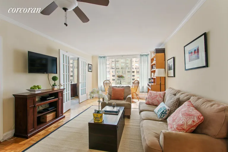 New York City Real Estate | View 61 West 62Nd Street, 6D | Living Room/Dining Room with Sunny Open Views | View 2