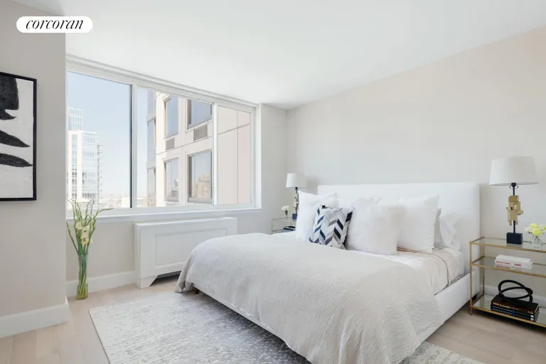 New York City Real Estate | View 389 East 89th Street, 28A | Master Bedroom w/ city views | View 4