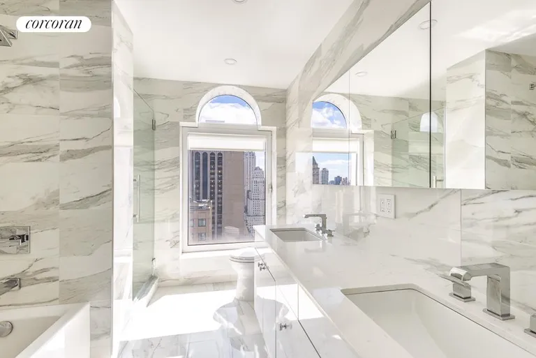 New York City Real Estate | View 106 Central Park South, 37A | Marble Master Bathroom | View 6