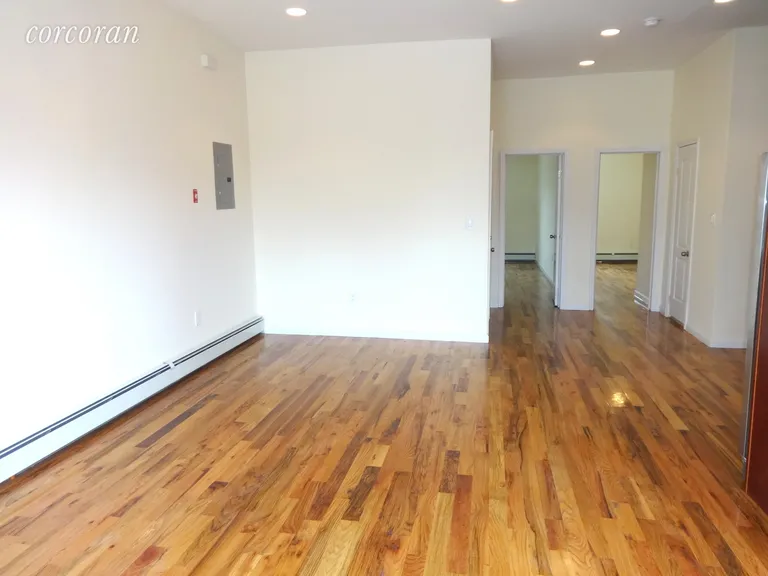New York City Real Estate | View 2340 Matthews Avenue, 2 | Reverse view of Living room | View 6