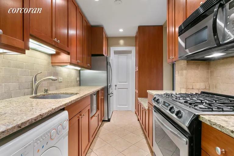 New York City Real Estate | View 146 East 49th Street, 3A | Modern Kitchen with Custom Cabinets | View 8
