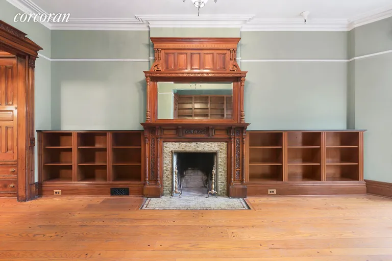 New York City Real Estate | View 234 Garfield Place, 2 | Built-in bookshelves surround decorative fireplace | View 8