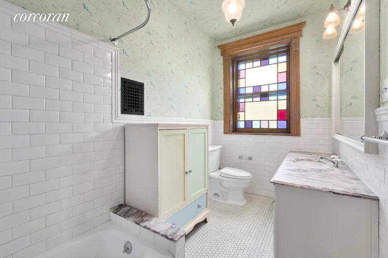 New York City Real Estate | View 234 Garfield Place, 2 | Spacious bath, marble vanity, stained-glass window | View 10