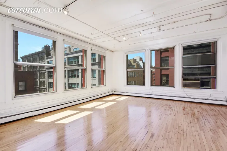 New York City Real Estate | View 132 Wooster Street, 3rd Floor | Giant Corner Master Bedroom (when painted white) | View 2