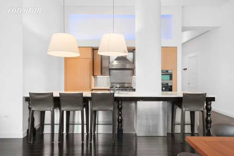 New York City Real Estate | View 15 Union Square West, 5A | Breakfast bar and customizable light installation | View 4