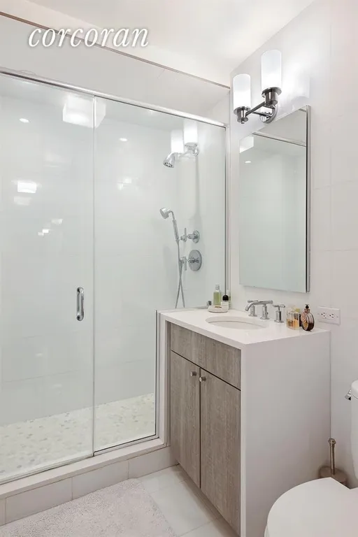 New York City Real Estate | View 170 East 87th Street, W11C | Renovated Master Bath | View 4