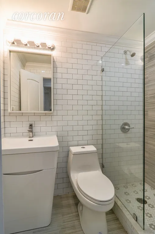 New York City Real Estate | View 746 Lexington Avenue, GRDN | Tiled Bathroom | View 9