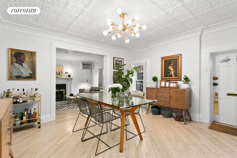 New York City Real Estate | View 99 State Street, 1E | Decorative white tin ceiling and millwork | View 3