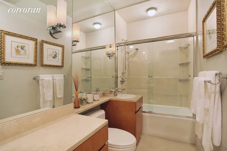 New York City Real Estate | View 300 East 74th Street, 26D | Beautifully renovated spacious bathroom | View 5