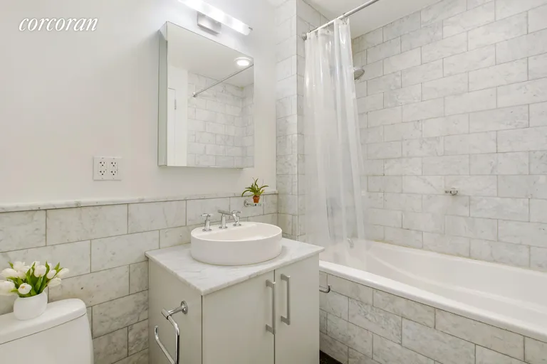 New York City Real Estate | View 199 State Street, 10B | Marble Bathroom | View 4