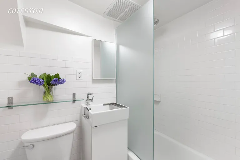 New York City Real Estate | View 163 West 79th Street, 4F | Renovated crisp bathroom  | View 5