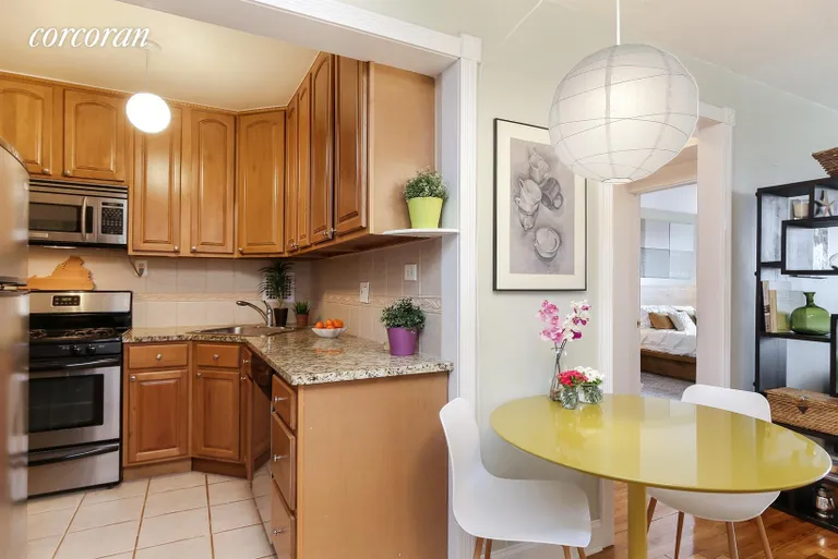 New York City Real Estate | View 820 Ocean Parkway, 722 | Fully Equipped Kitchen Open to Dining Area | View 5