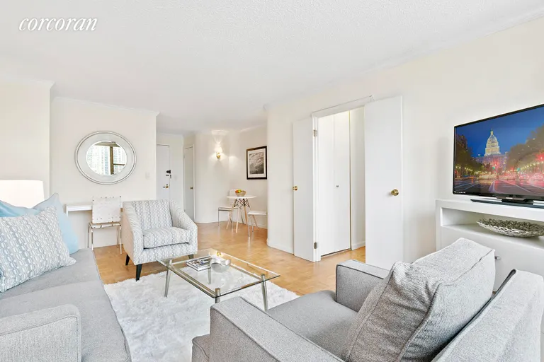 New York City Real Estate | View 301 East 79th Street, 18F | Living Room & Dining Area | View 4