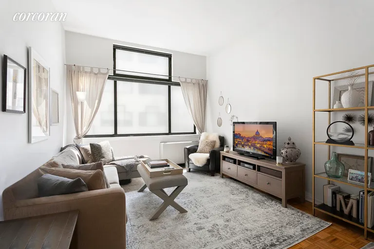 New York City Real Estate | View 77 Bleecker Street, 312 | Living room with high ceilings! | View 2