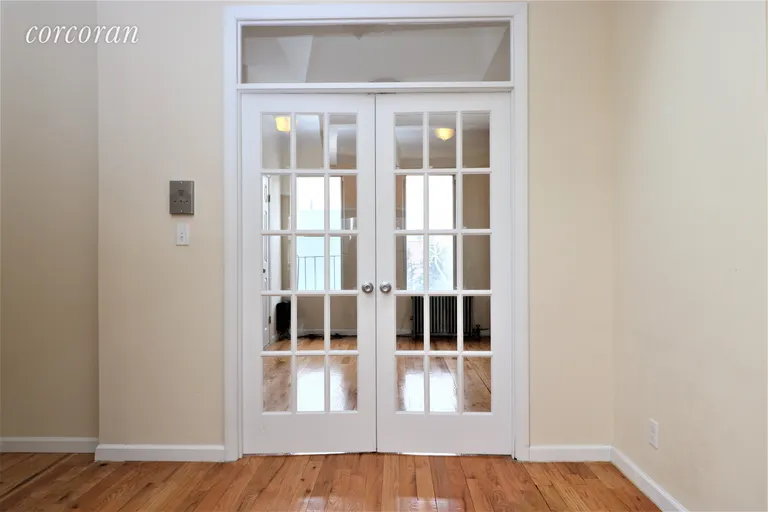 New York City Real Estate | View 13 Newel Street, 3R | French Doors to Bedroom | View 7