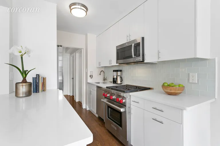 New York City Real Estate | View 30 East 9th Street, 5LL | Open Kitchen with Wolfe and Bosch appliances | View 3