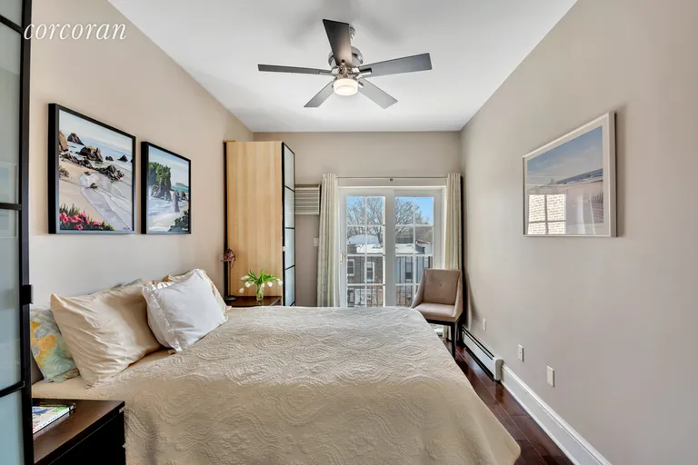 New York City Real Estate | View 1671 11th Avenue, 3E | Master bedroom with balcony | View 4