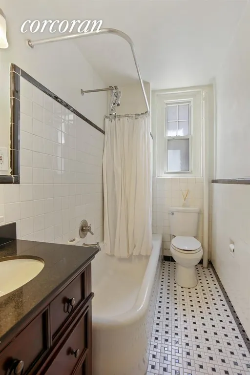 New York City Real Estate | View 209 Lincoln Place, 1C | Windowed bathroom with large soaking tub | View 4