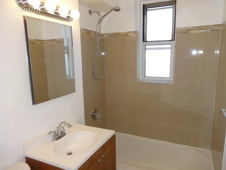 New York City Real Estate | View 2104 Holland Avenue, 5D | Beautifully Tiled Bath | View 6