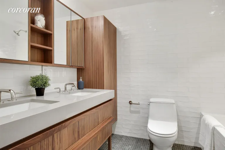 New York City Real Estate | View 215 Lafayette Avenue, C | Bathroom with custom linen closet | View 10
