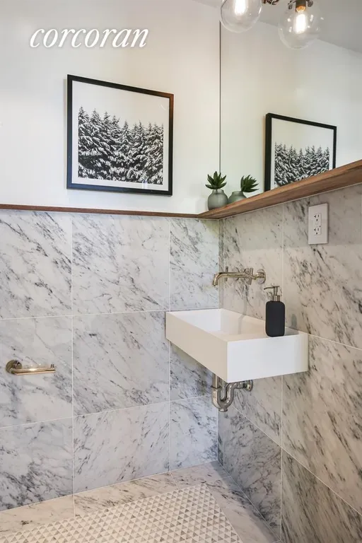New York City Real Estate | View 215 Lafayette Avenue, C | Stunning powder room with marble and custom sink | View 11