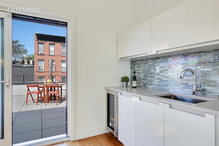 New York City Real Estate | View 90 Luquer Street | Wet bar with under-counter wine fridge | View 21