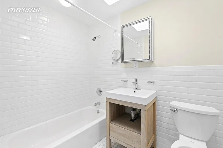 New York City Real Estate | View 290 Lafayette Avenue, 2 | Bathroom with skylight | View 7