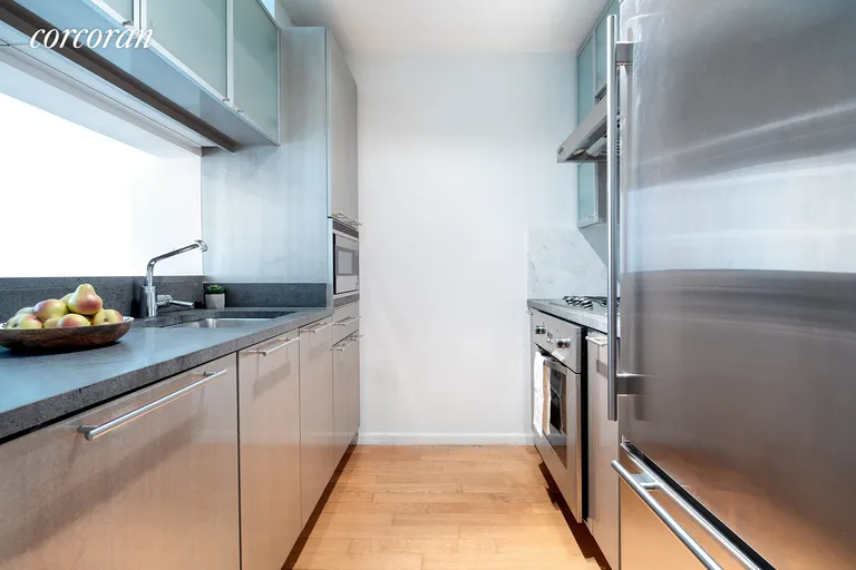 New York City Real Estate | View 200 Chambers Street, 3S | MODERN CHEF'S KITCHEN WITH PASS-THROUGH | View 5