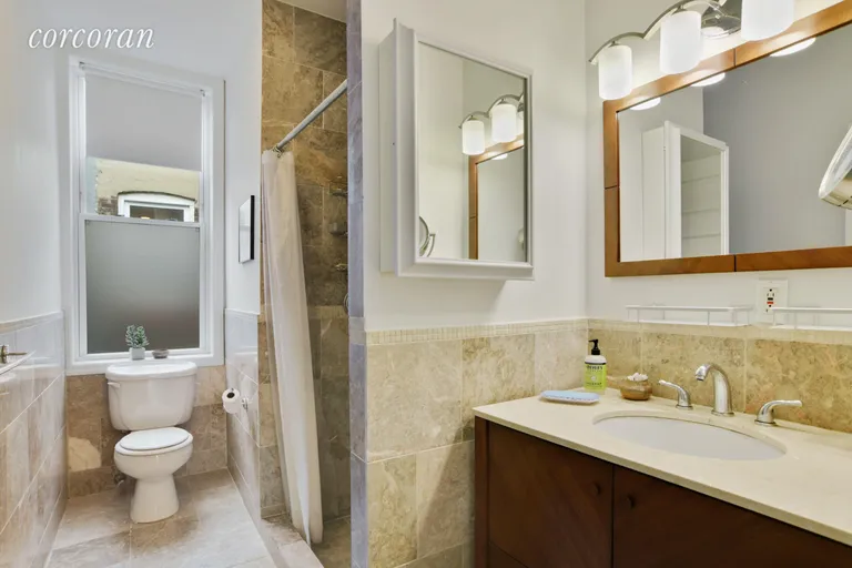 New York City Real Estate | View 658 Park Place, 9 | En Suite Windowed Master Bathroom w/ Stall Shower | View 7