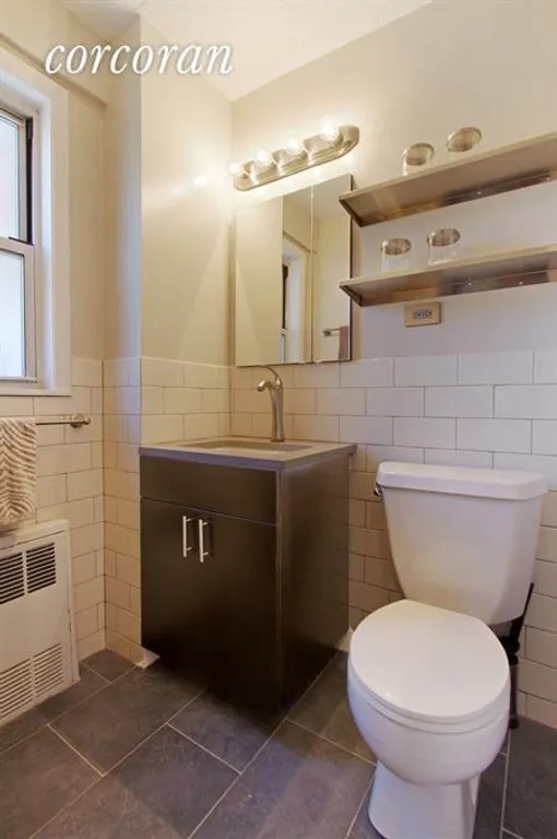 New York City Real Estate | View 77 East 12th Street, 16K | Bathroom with Window | View 5