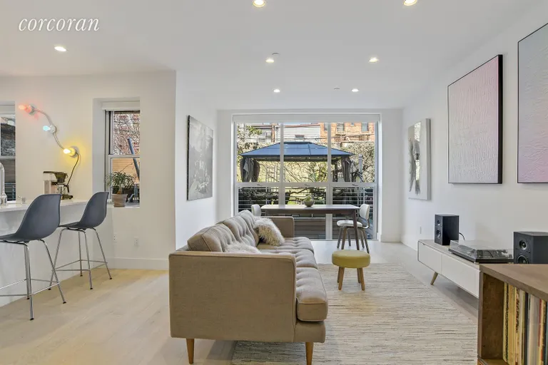 New York City Real Estate | View 61 Conselyea Street, B1 | Living Room | View 2