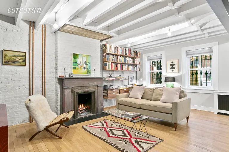 New York City Real Estate | View 44 Monroe Street | Wood burning fireplace in the home office/lounge! | View 8