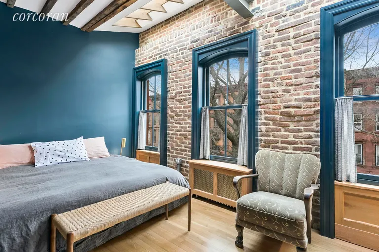 New York City Real Estate | View 44 Monroe Street | Skylights and a wall of windows in this bedroom! | View 5