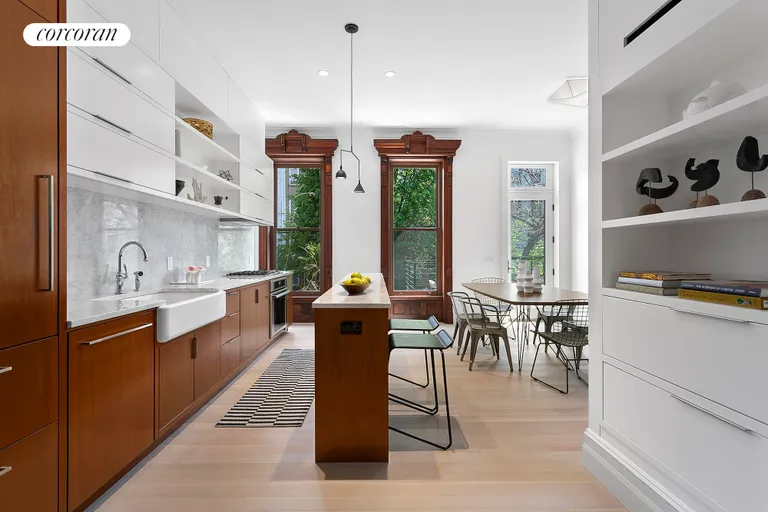 New York City Real Estate | View 194 MacDonough Street | Kitchen and Dining Room Overlooking Garden | View 3